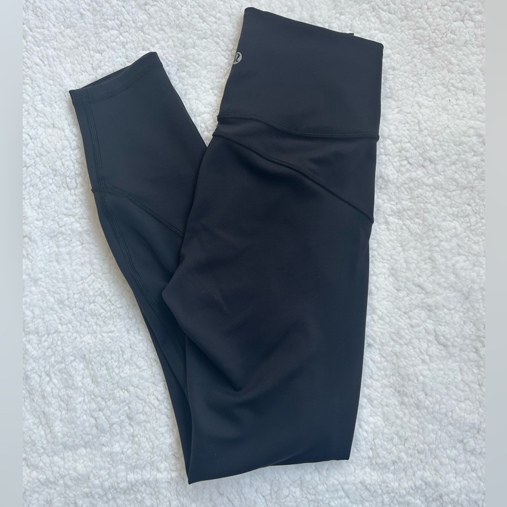Lululemon black leggings size 4
